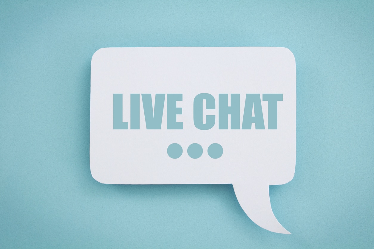 Live Chat written in a white speech bubble, on a blue background.